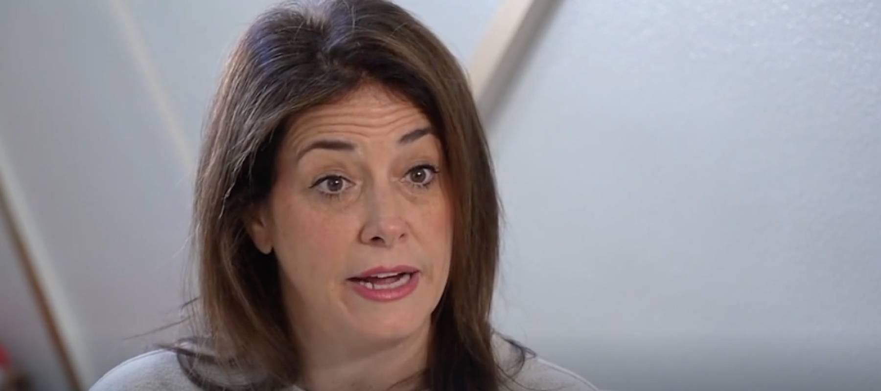 Florida resident Sheri Amarillas speaking to a reporter.