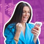 Excited woman checking her phone