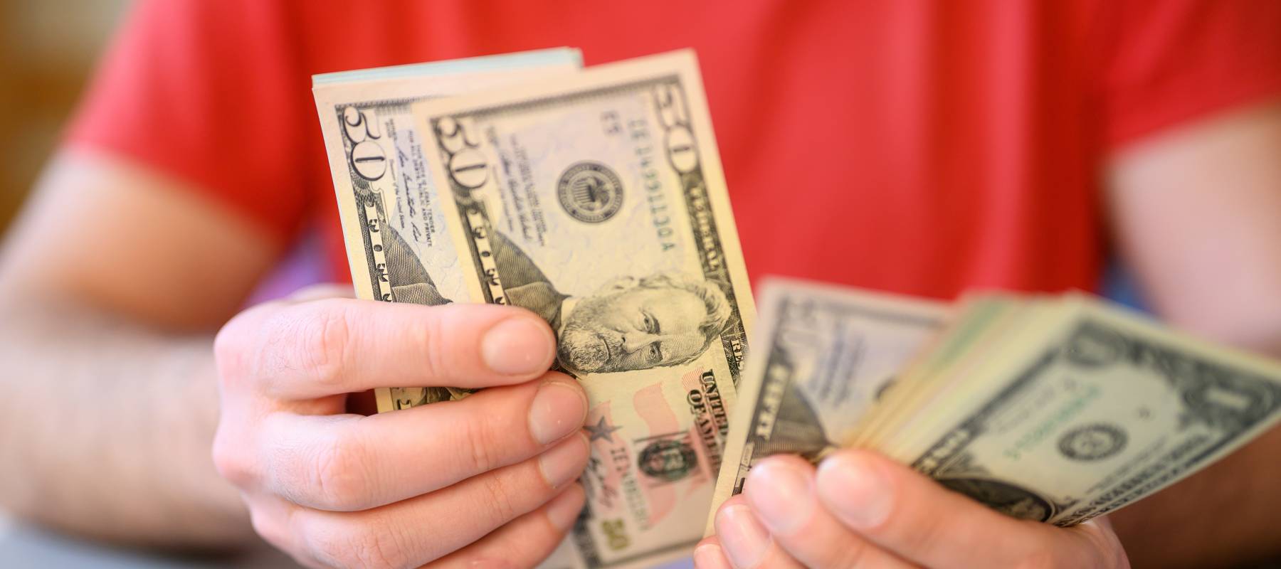 Man counting money