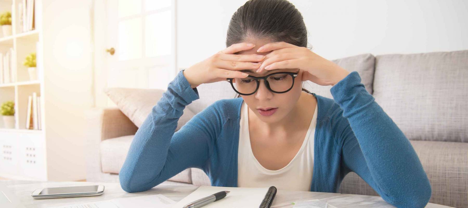 beauty asian stressed worried young woman is doing banking and administrative work, reviewing her student loan debt.