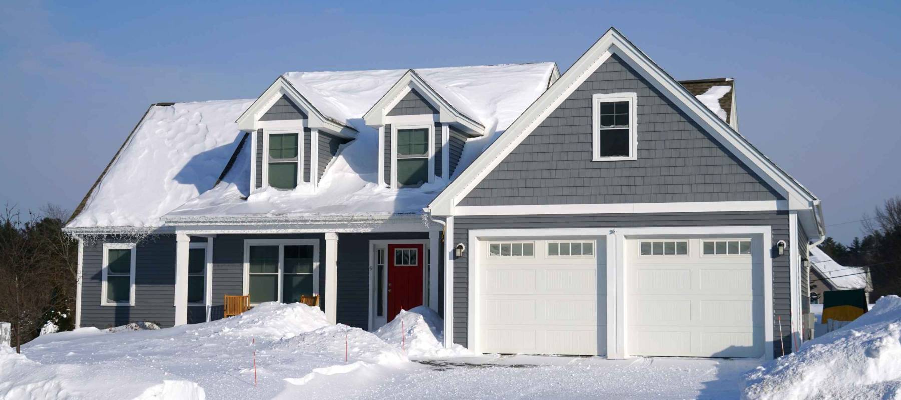 Winter house front view after snow storm