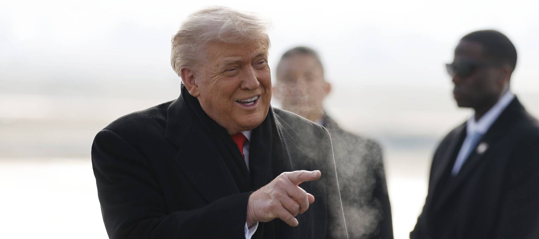U.S. President Donald Trump disembarks Air Force One as he arrives at Zurich Airport before attending the World Economic Forum (WEF) in Davos.