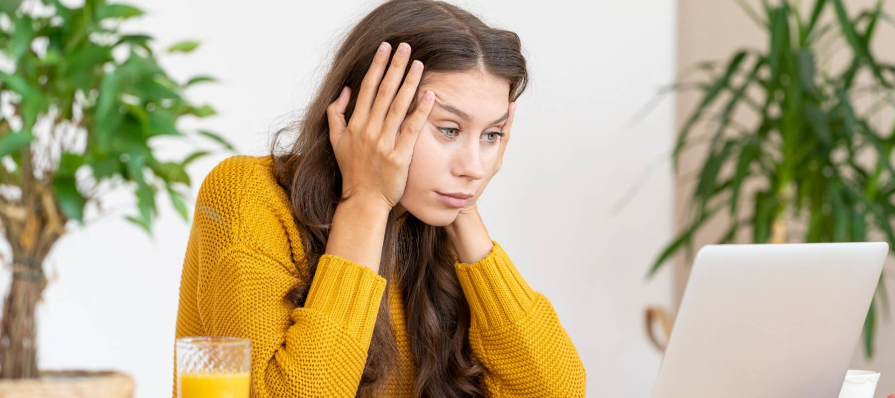 Close-up Of A Businessperson's Hand Marking Error With Red Marker