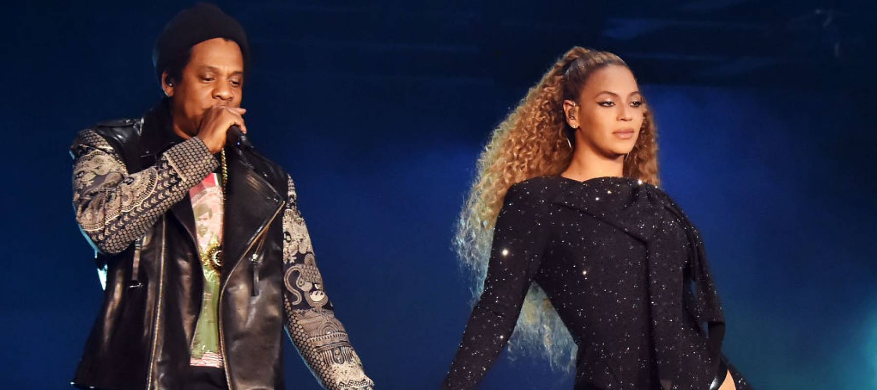 Jay-Z and Beyonce Knowles perform on stage during the "On the Run II" tour.