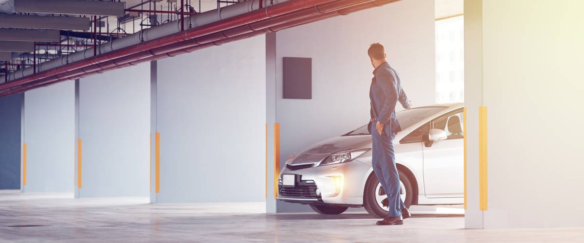 Man walking around the parking lot