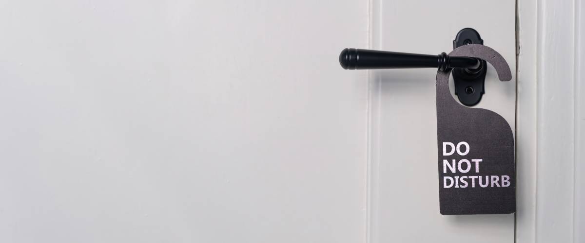 Do not disturb text sign, hotel room hanger.