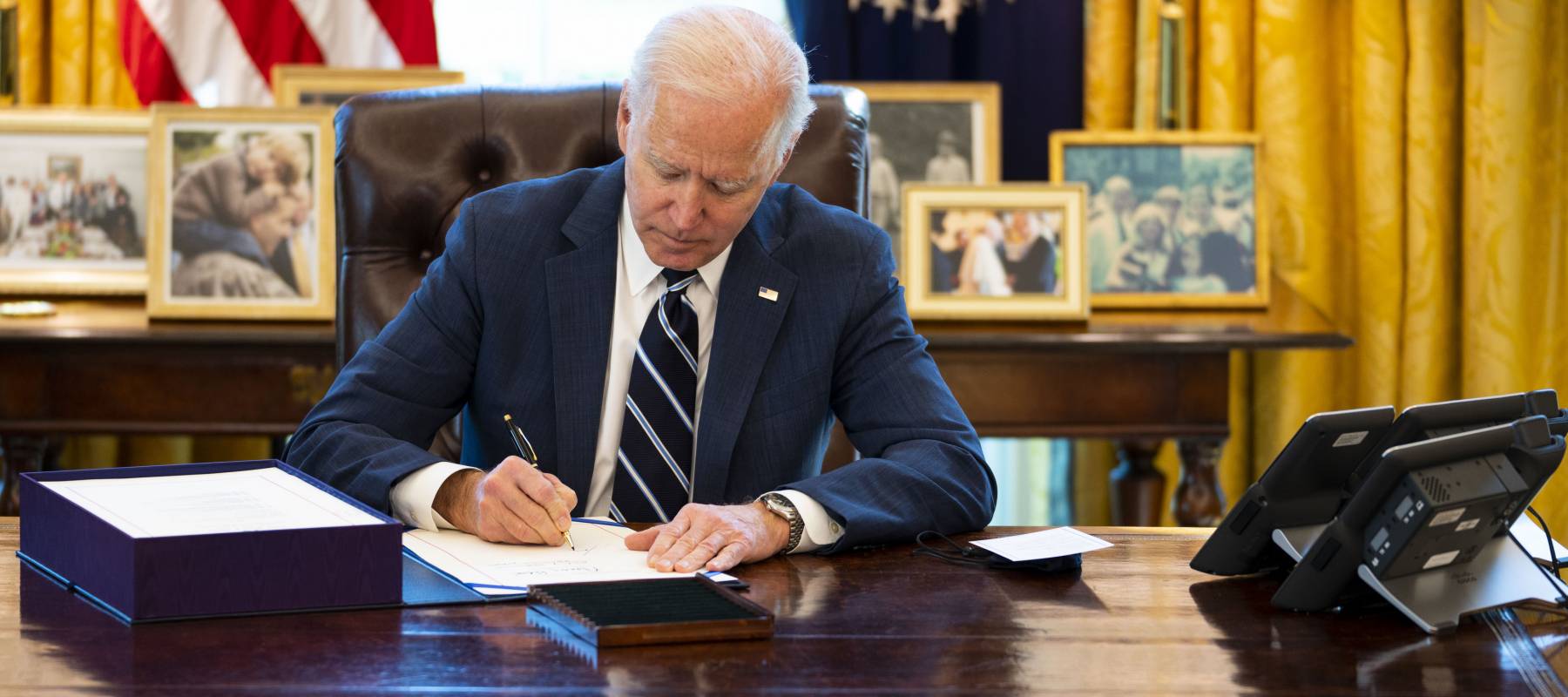 President Joe Biden signs $1.9 trillion covid relief bill.