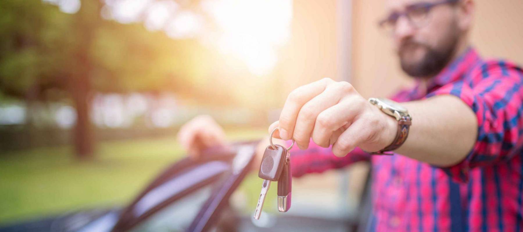 Man holding car keys