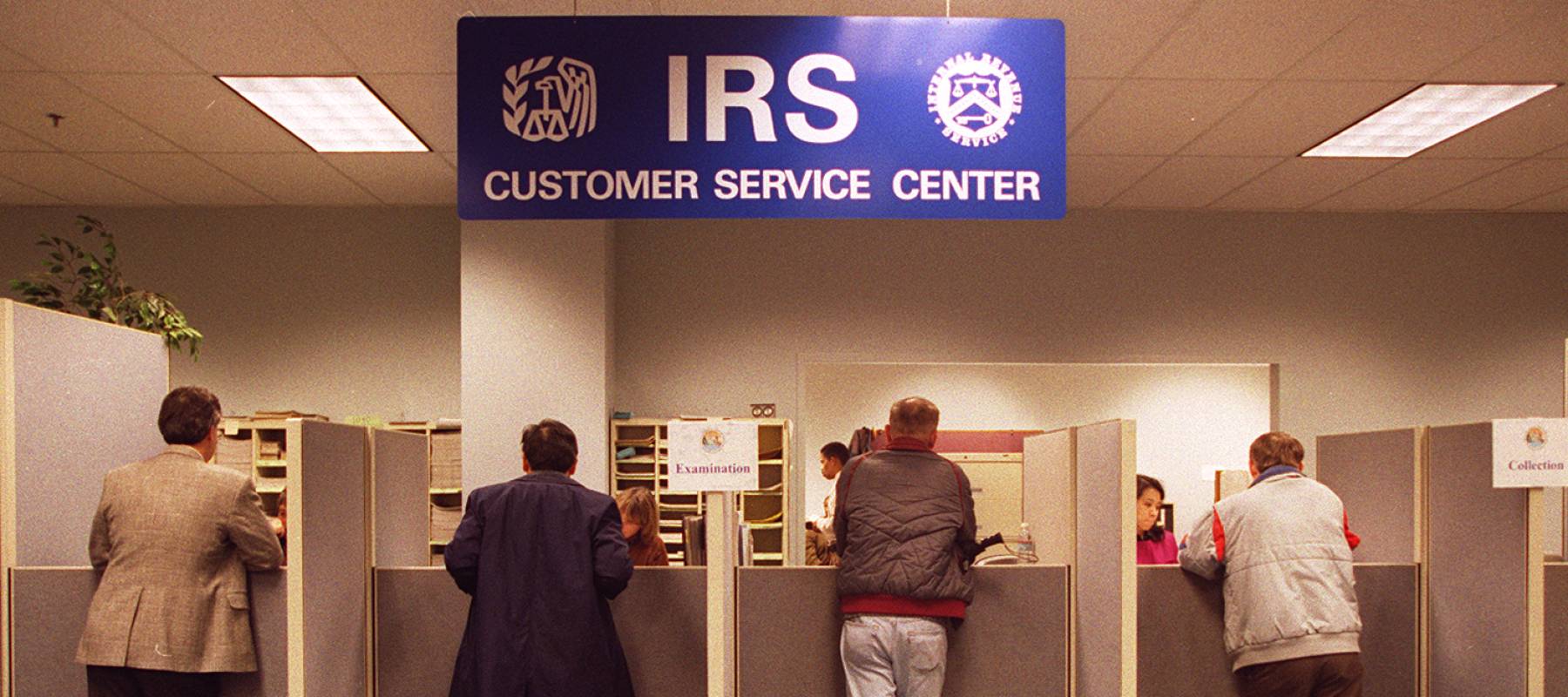 People wait in line to get help at the IRS in the 1990s.