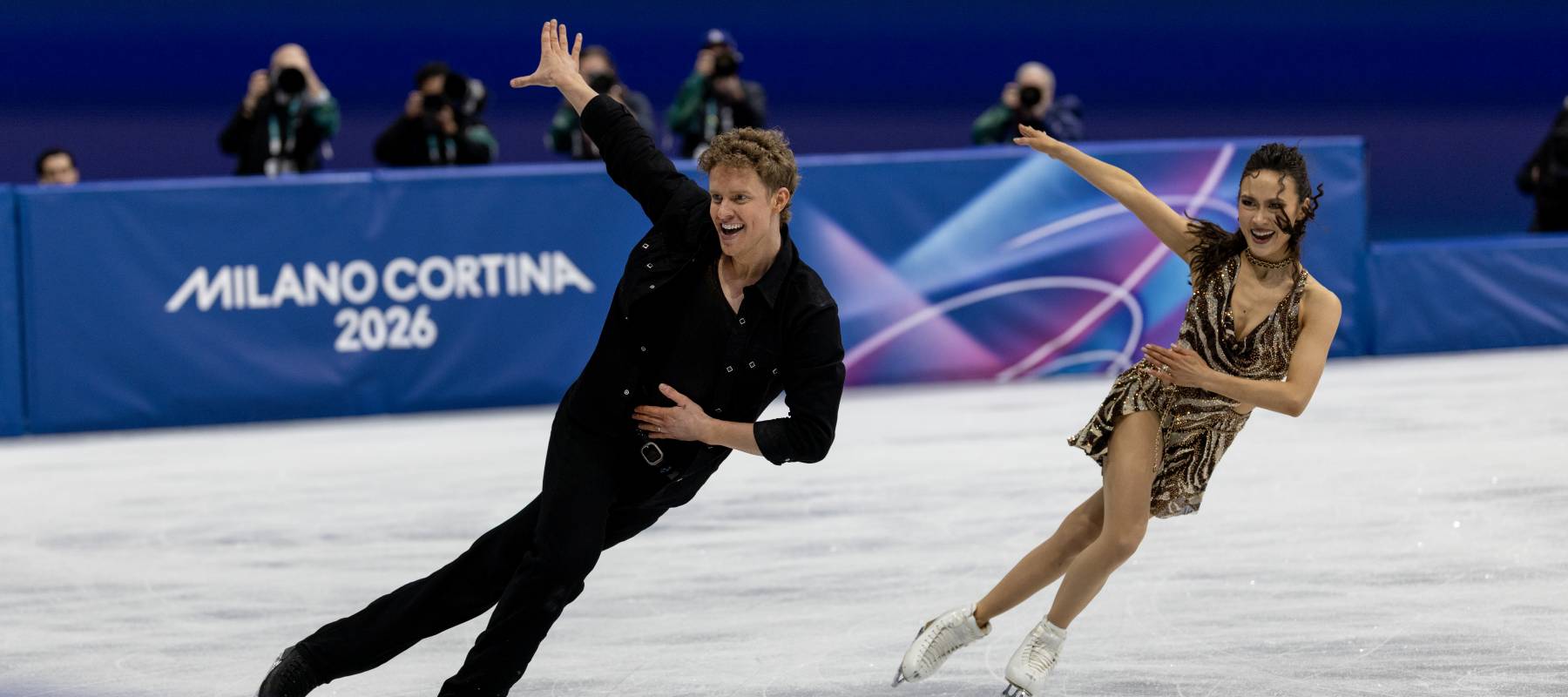 Gold medalists Madison Chock and Evan Bates perform in the Milano Cortina Olympics.
