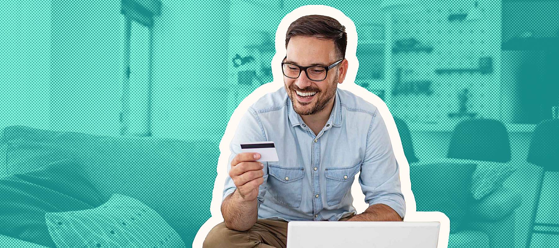 Happy cheerful man smiling while e-shopping