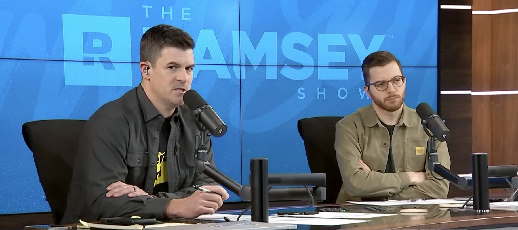 The Ramsey Show co-hosts John Delony (left) and George Kamel speak with caller Jamie.