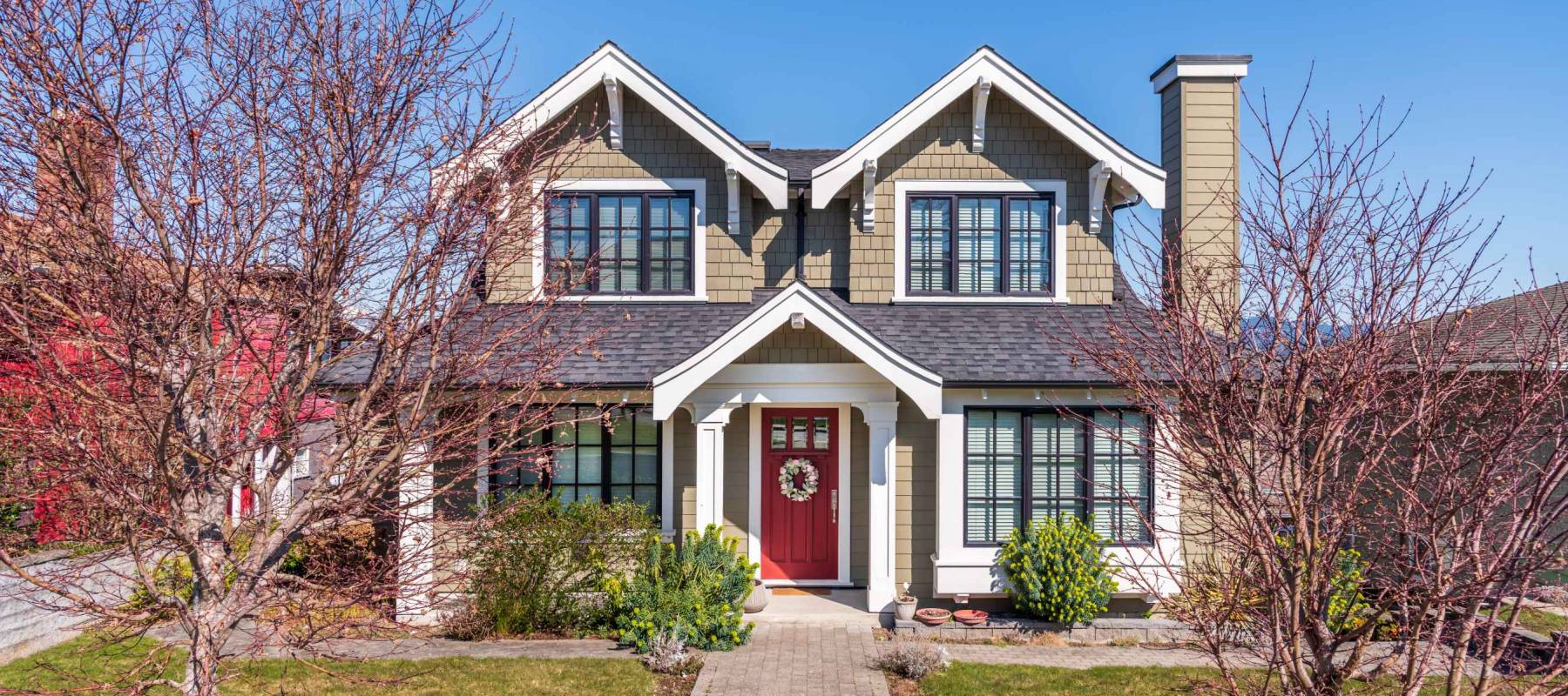 Houses in suburb in the north America. Luxury houses with nice spring landscape.