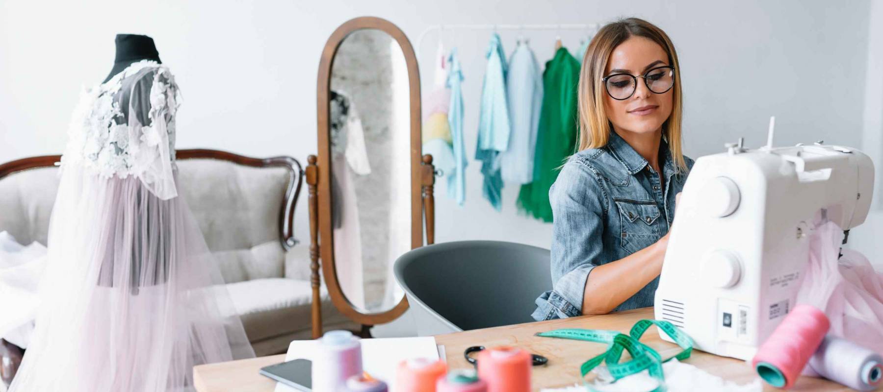 Woman making crafts or clothes.