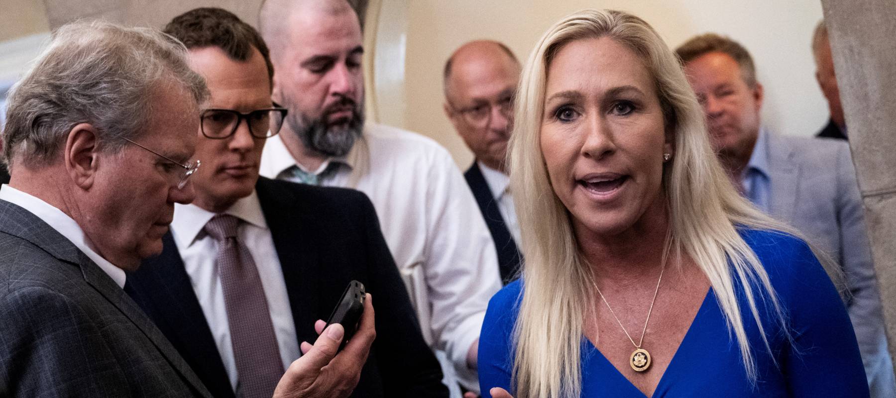 US Representative Marjorie Taylor Greene, Republican of Georgia, speaks to reporters before a meeting with US Speaker of the House Mike Johnson, Republican of Louisiana.