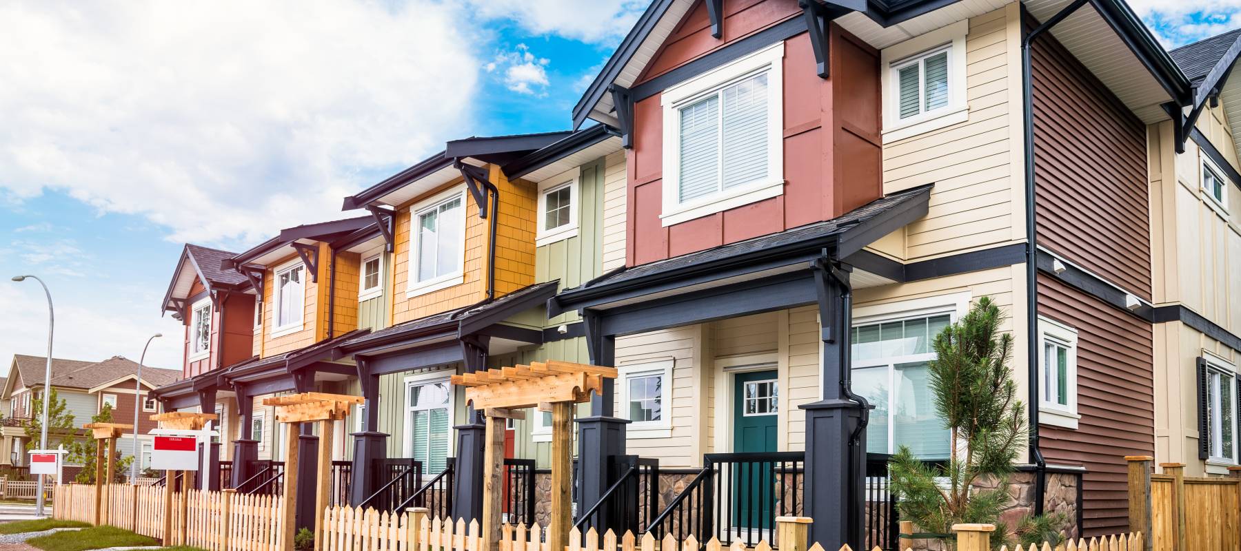 White paper house with dollars banknotes