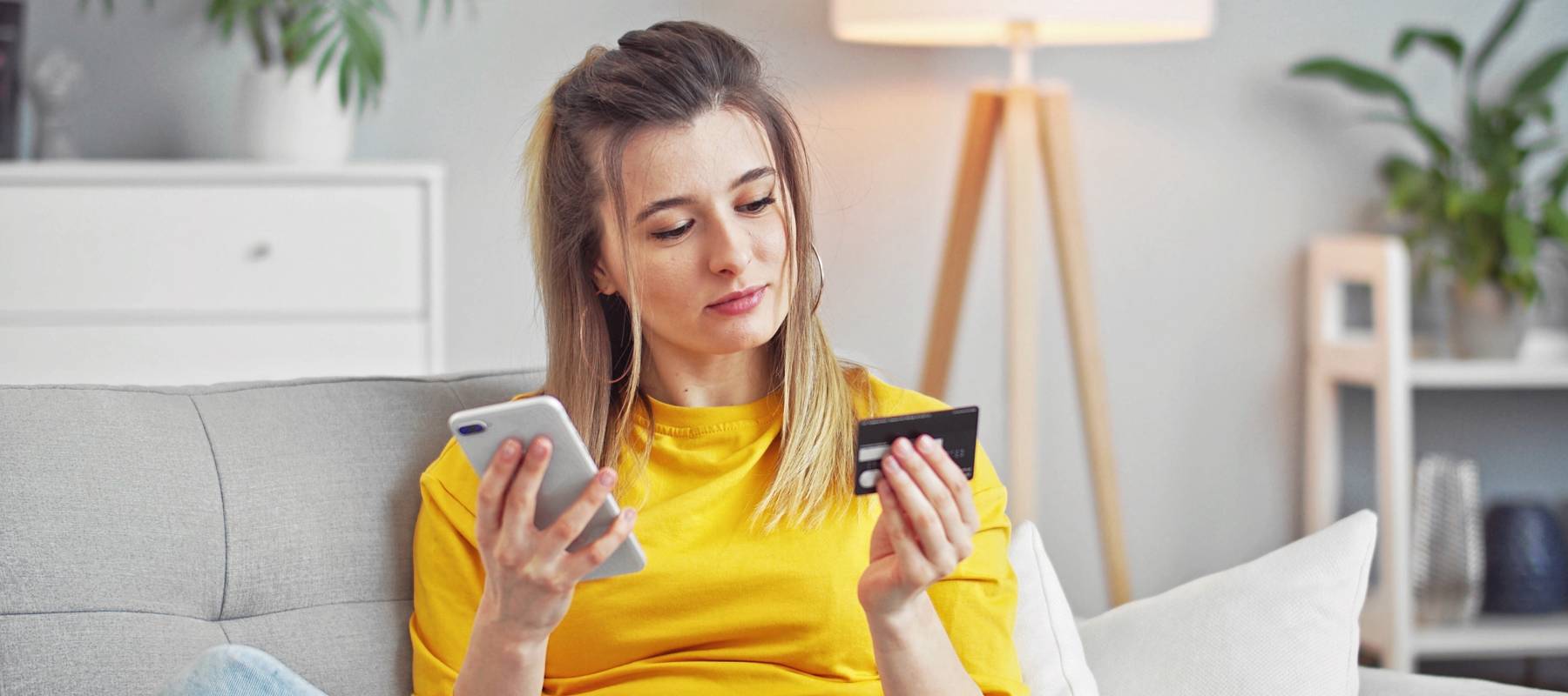 Woman receiving new credit card.