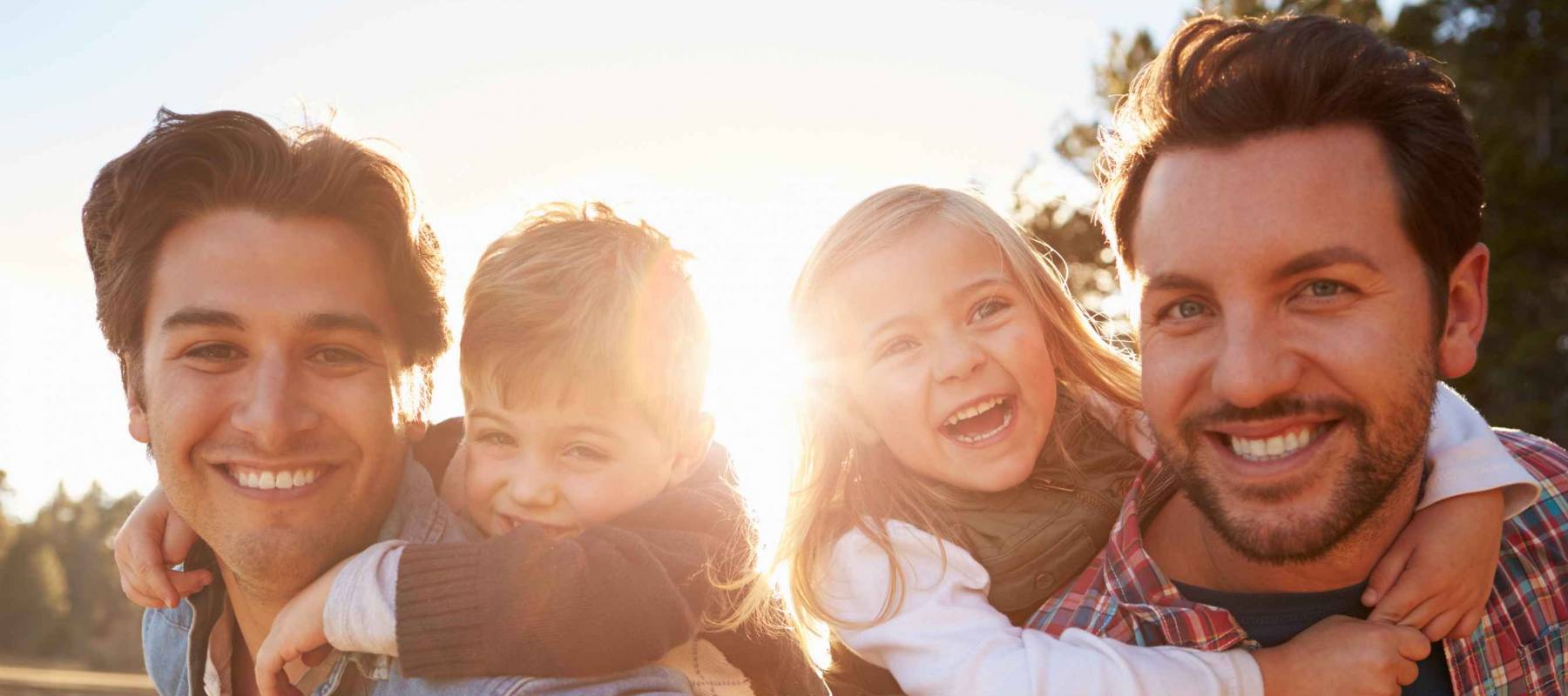 LGBTQ couple and their children.