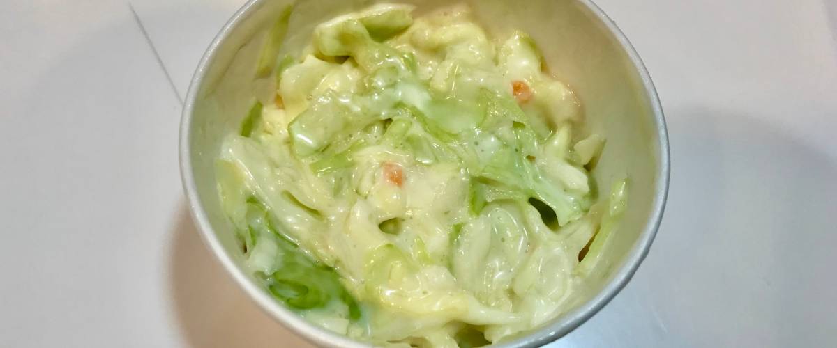 Takeout coleslaw in plastic container