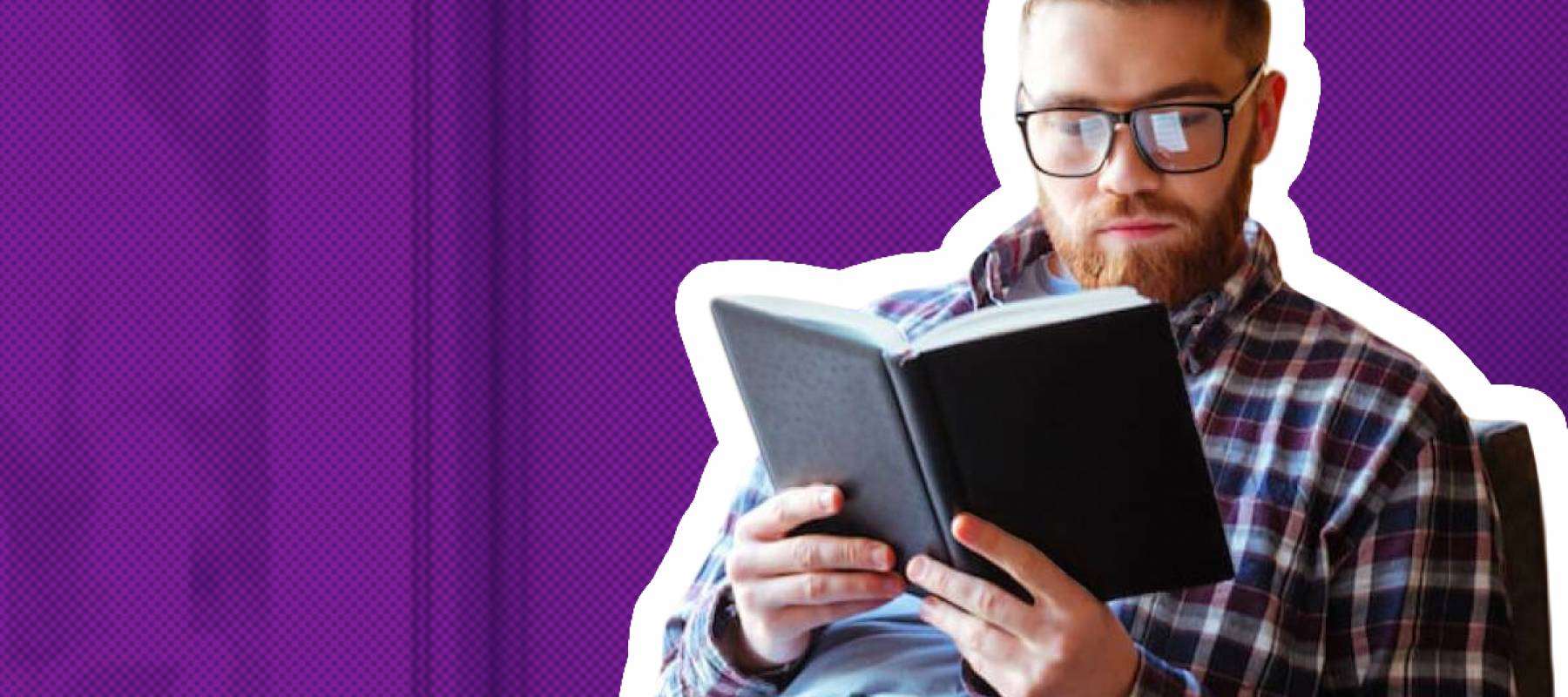 Young man reading a book