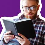 Young man reading a book