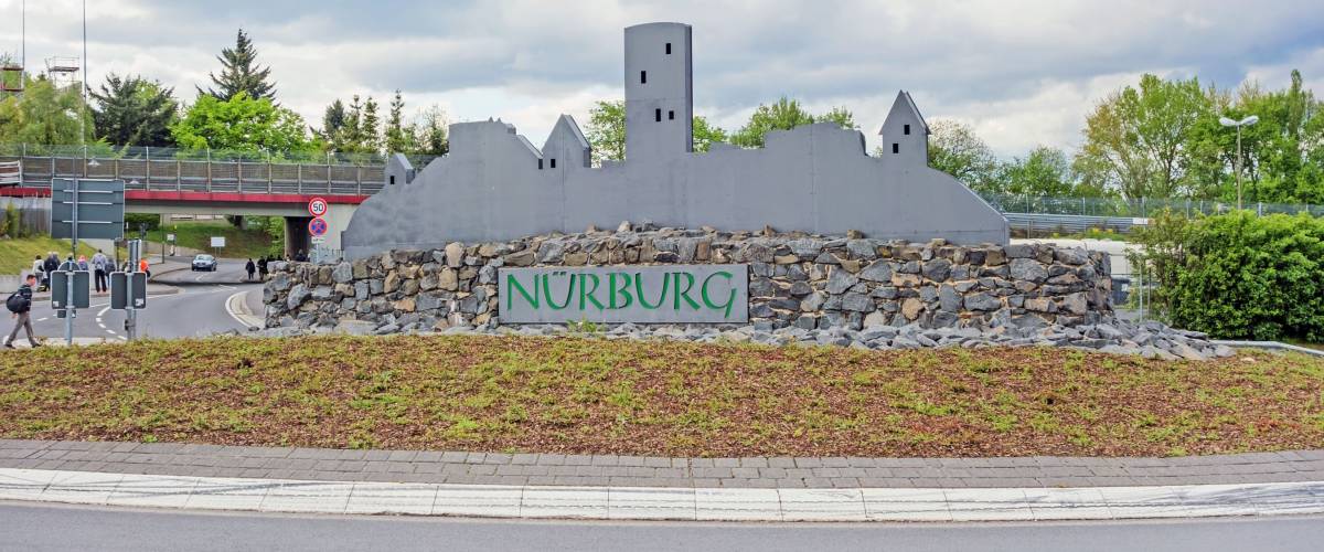 Nurburg, Germany - May 20, 2017: Silhouette of Castle Nurburg near race track Nurburgring at traffic circle