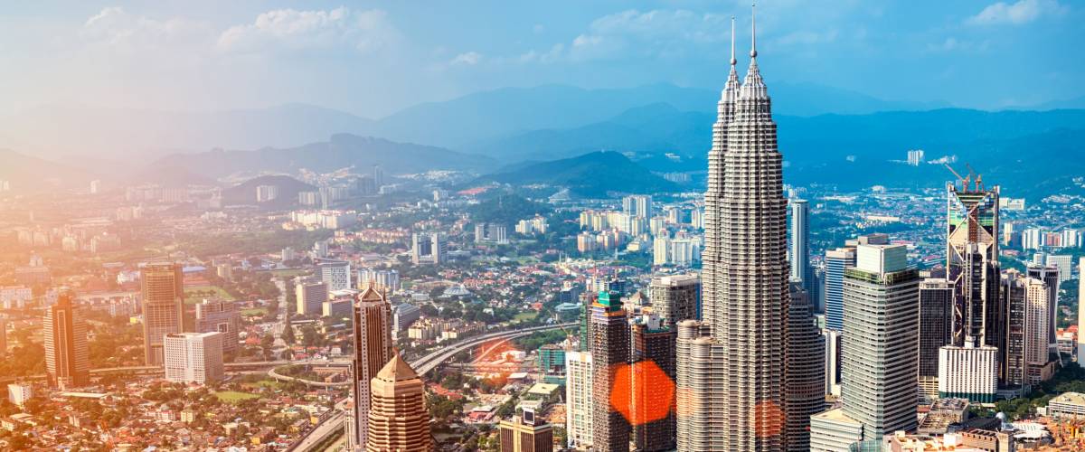 Kuala Lumpur skyline with the Petronas Towers and other skyscrapers. (Malaysia.)