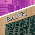 Bank sign on glass wall of business center