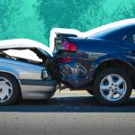 Auto accident involving two cars on a city street