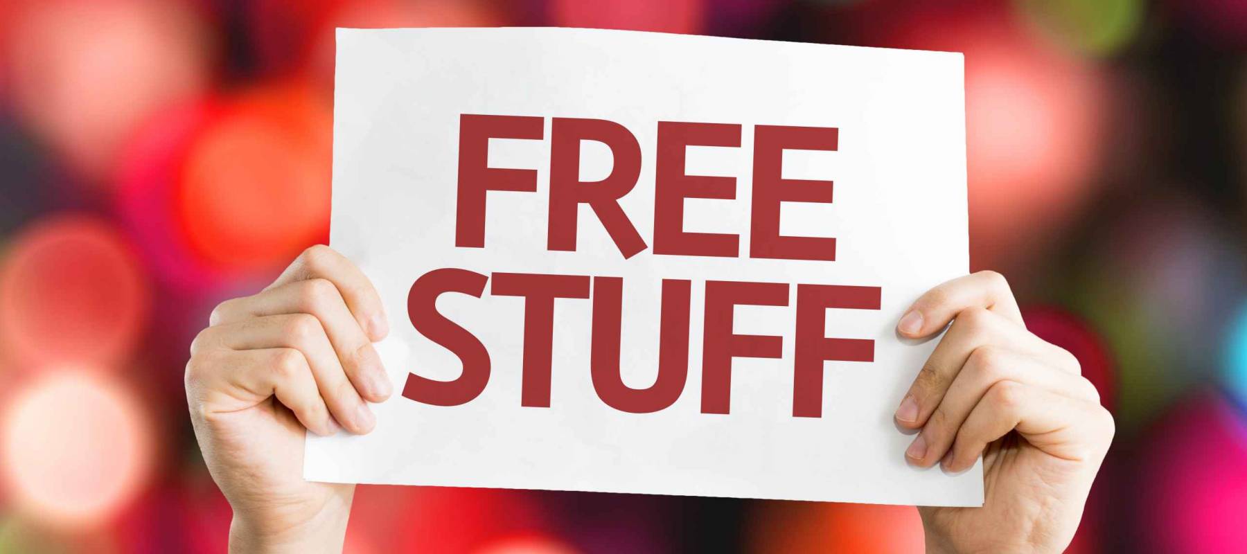 Free Stuff card with colorful background with defocused lights