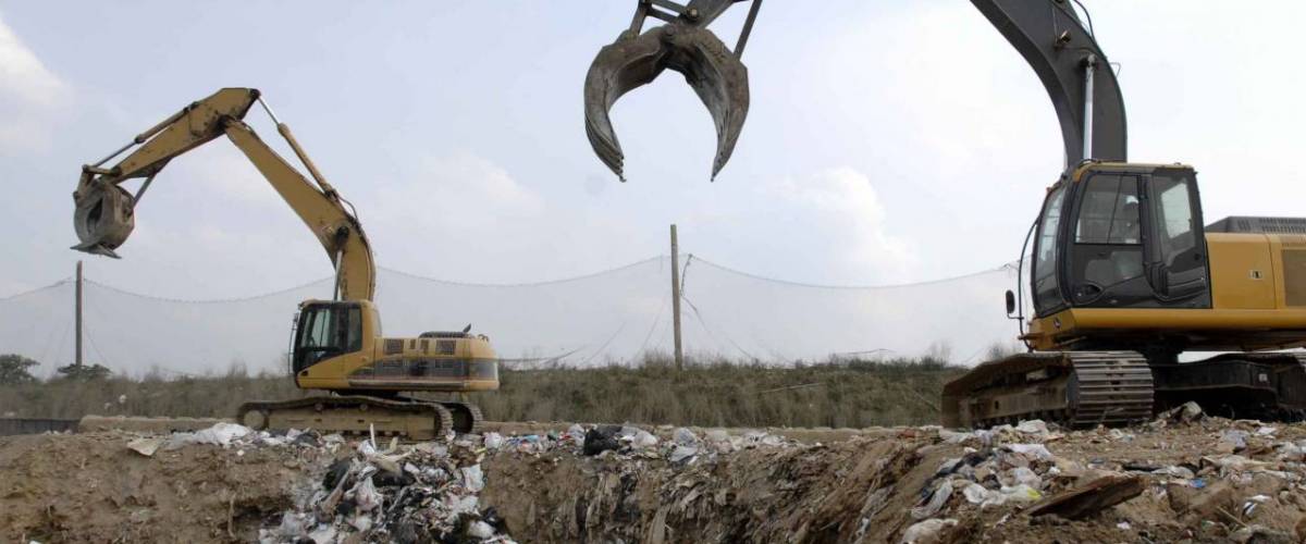 claw loaders working at a landfill in Maryland