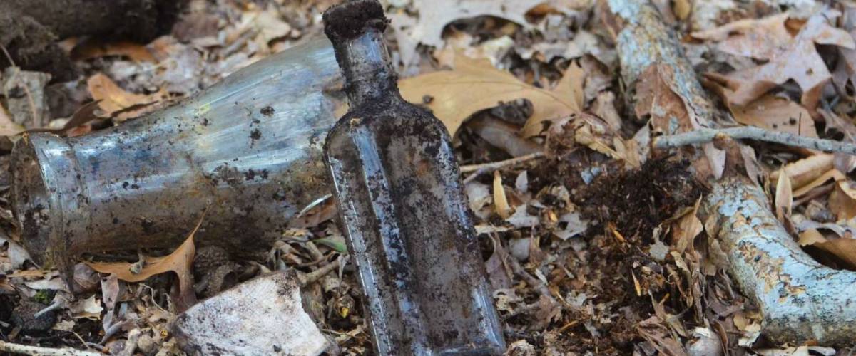 Freshly dug up antique bottles from some woods in Delaware.