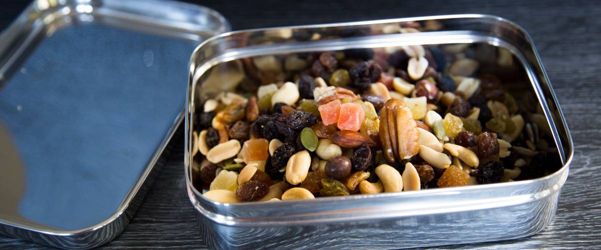 Trail mix in a metal tin