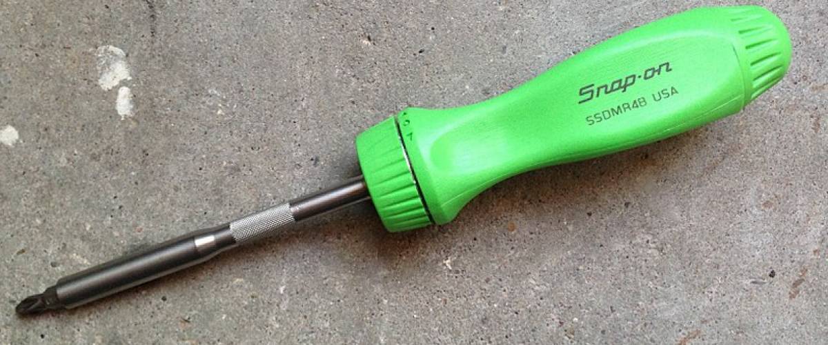 Green handled screwdriver