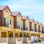 Row of yellow townhouses