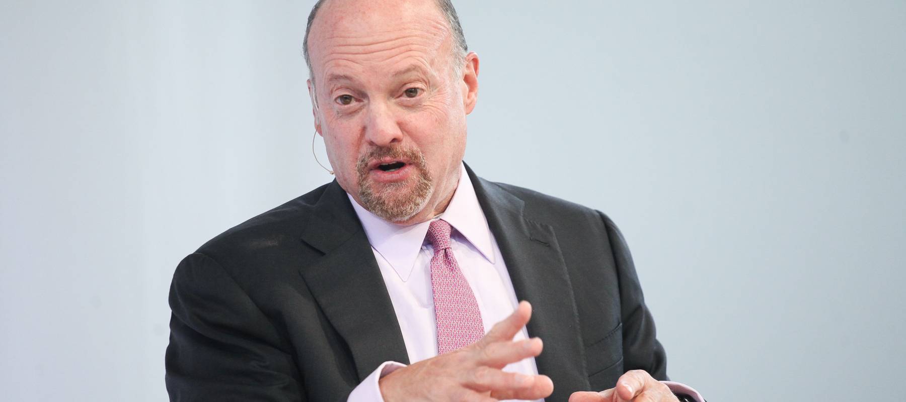 Jim Cramer wears a suit and looks to the side of the camera in the middle of saying something.