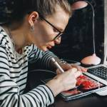 Artist working at computer