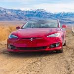 Tesla on the side of a road