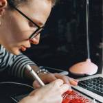 Artist working at computer