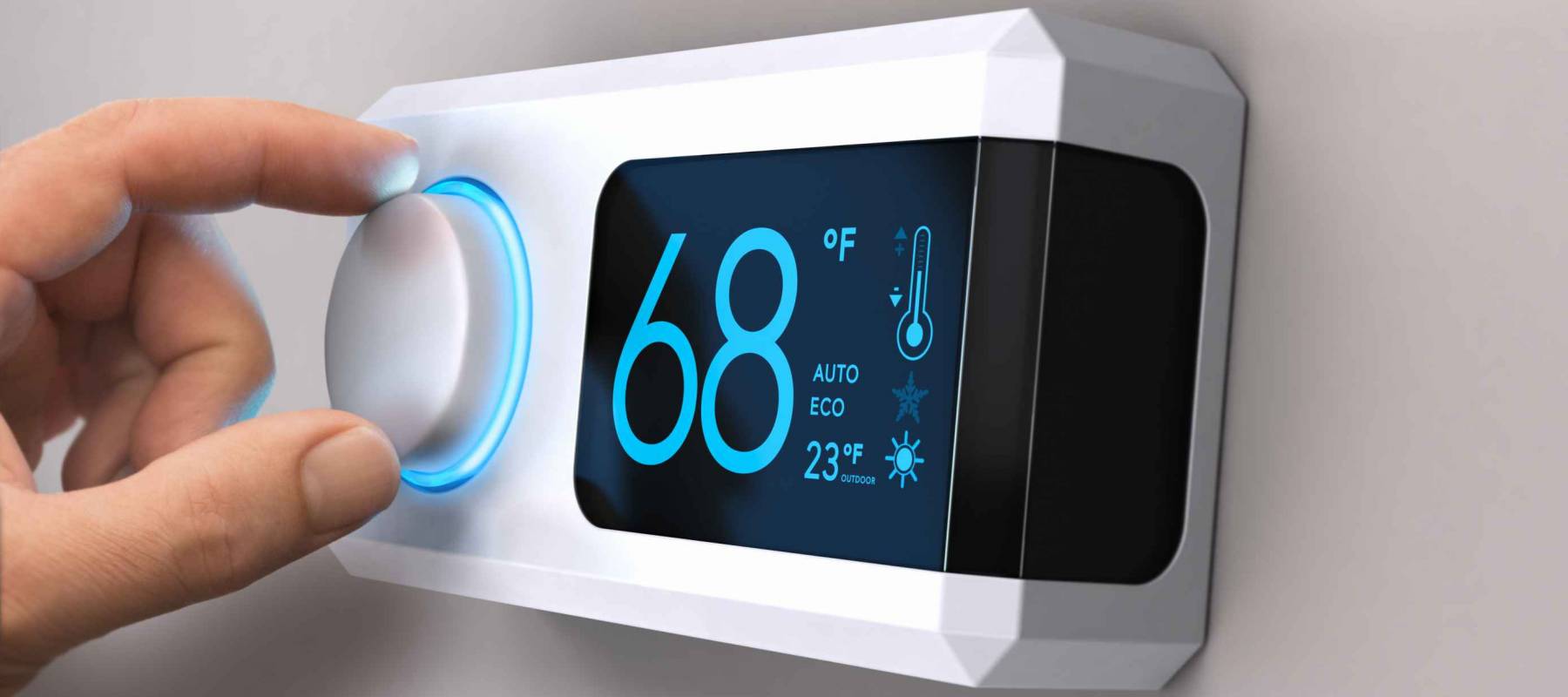 Hand turning a home thermostat knob to set temperature on energy saving mode. fahrenheit units. Composite image between a photography and a 3D background.