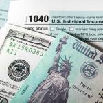 Stimulus economic tax return check and and 1040 Form.