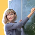 Female teacher at blackboard teaching angles