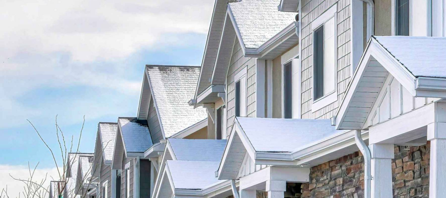 Square Row of houses in the scenic suburbs community with overcast sky