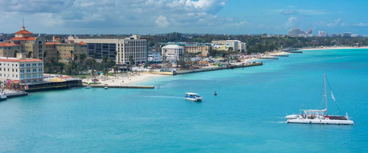 Downtown Nassau, Bahamas on Providence Island with the Nassau port, beach, hotels, and ships