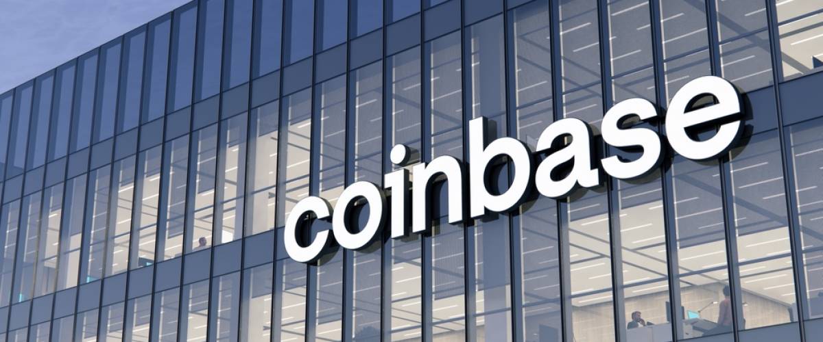 Coinbase logo on a glass office building