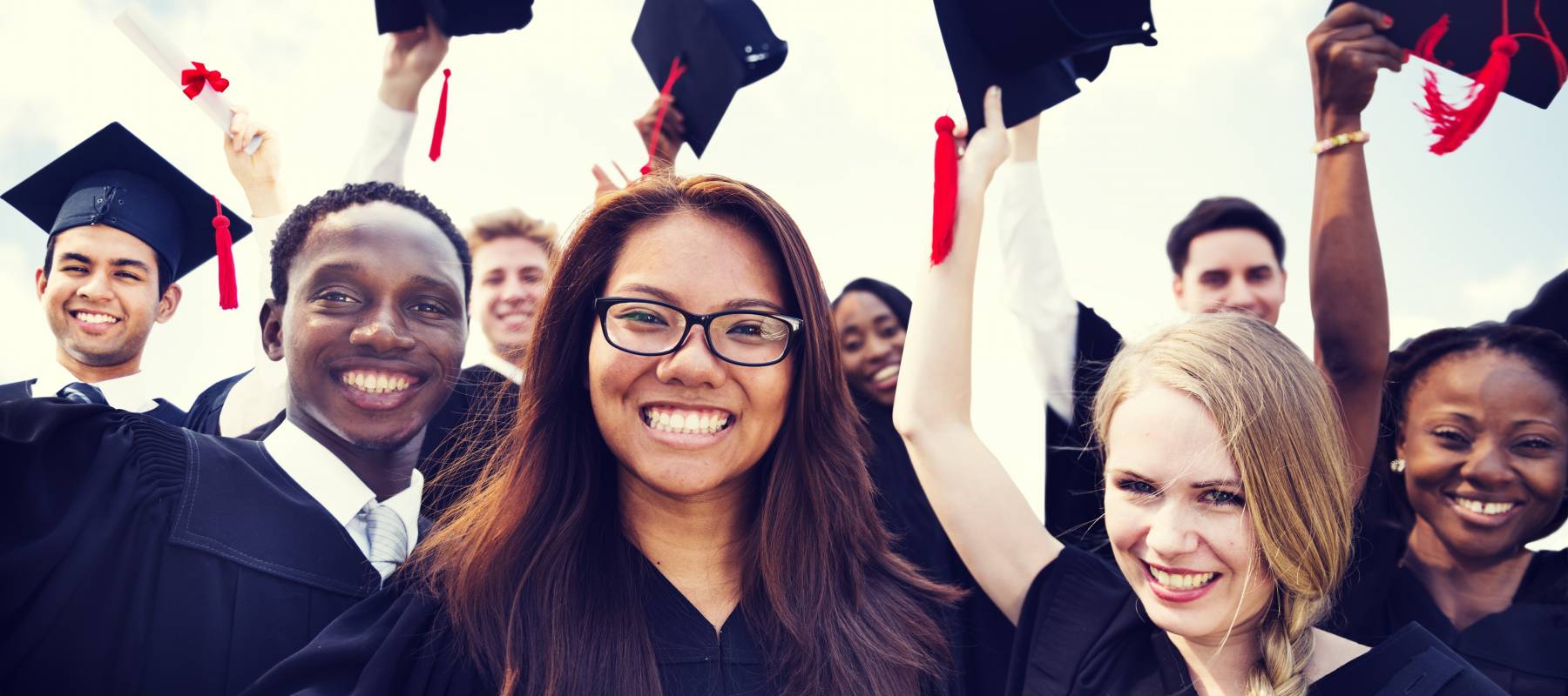 Group of Diverse International Graduating Students Celebrating