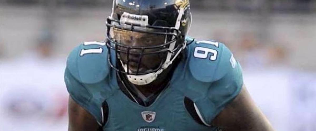 Derrick Harvey wearing Jacksonville Jaguars Jersey