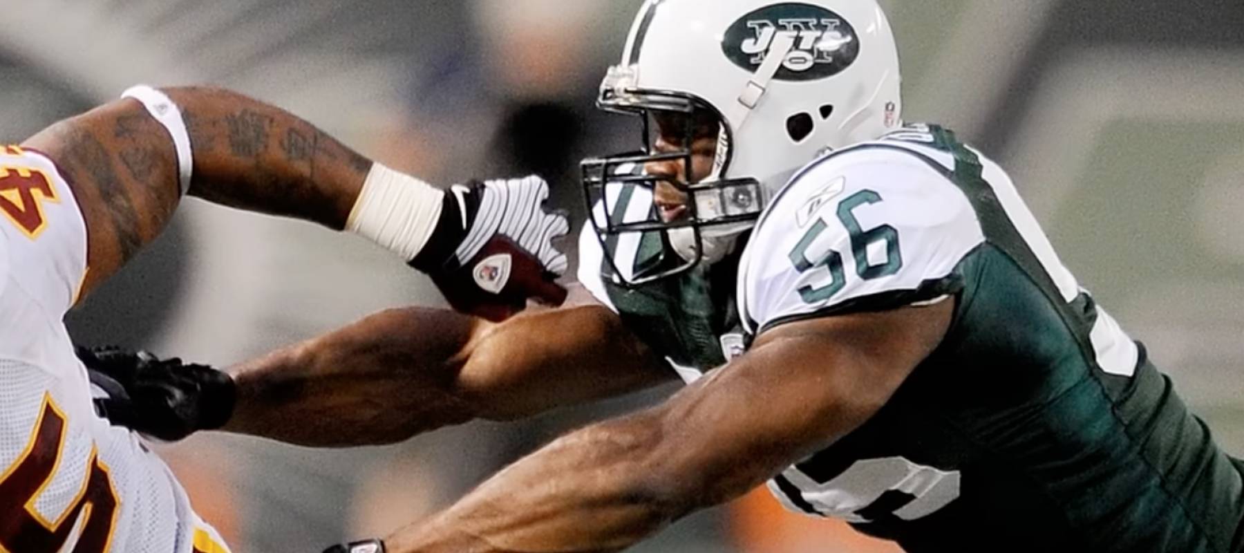Side shot of Vernon Gholston in Jets Jersey