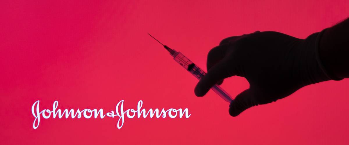 Johnson & Johnson logo with syringe