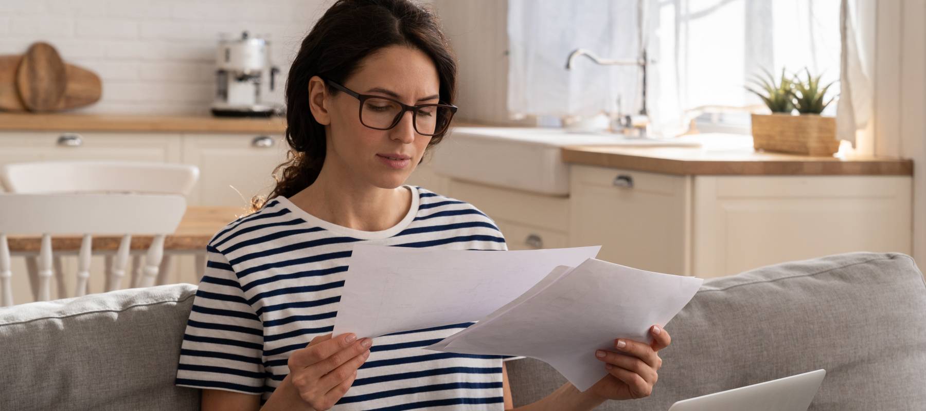 Woman looks at papers